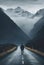 Solitary Journey: Man Walking on Road to Majestic Mountains. Generative ai