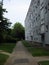 A solitary path stretches before a concrete block in Kiel Mettenhof, leading the way into an unknown future.