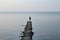 Solitary Silhouette on Sea Pier