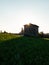 Solitary stone hut at sunrise