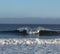 A Solitary Surfer Appraoches the Waves