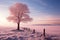 A solitary tree graces a scenic winter landscape with serene beauty