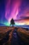 Solitary tree under colorful northern lights in dark sky