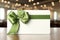Solitary white backdrop showcases gift card, featuring delicate green ribbon bow.