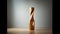 a solitary wooden sculpture