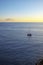 Solitary yacht anchored nearby Playa San Juan beach, Tenerife, Canary Islands, Spain