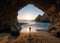 Solitude Amidst Nature\\\'s Sanctuary: Silhouette of a Man in a Beach Cave