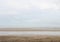 Solitude person walks down the seaside