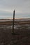 Solitude - Wooden Post At Ravenglass Beach, Cumbria, UK