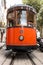 Soller, Majorca, Spain - August 4, 2020: Front view of the wagon of the typical Soller train. An old wooden tram in Majorca, Spain