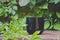 A solo blank white coffee mug on the bamboo table edge