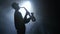Solo concert of the actor playing on the saxophone. Smoke