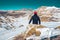 Solo man hiking on italian Alps mountain range Italy - Hiker walking during the end of winter - Concepts about travel  lifestyle