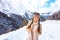 Solo traveller woman in front of mountain landscape