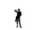 Solo woman dancing elements of ballroom dancing. Silhouette, slow motion