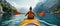 Solo woman kayaking in the sea, rear view of adventurous outdoor pursuit in stunning summer setting