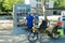 Solothurn, SO / Switzerland - 2 June 2019: biccle tourists stop and enjoy the books at one of the free open libraries in the city