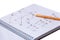 Solution of a mathematical problem in a notebook and pencil lying on paper