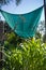 Solution of tarpaulin preventing plants drying from heat in summertime giving them shade, turkey