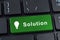 Solutions button keyboard with icon lightbulb.