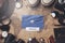 Somalia Flag Between Traveler`s Accessories on Old Vintage Map. Overhead Shot