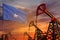 Somalia oil industry concept. Industrial illustration - Somalia flag and oil wells with the red and blue sunset or sunrise sky