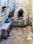 Somber kitchen with vintage oven in Santa Catalina monastery, Arequipa, Peru