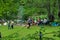 Some Bulgarian families spend Sundays in a meadow near a river in Pirin National Park, Bulgaria