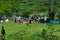 Some Bulgarian families spend Sundays in a meadow near a river in Pirin National Park, Bulgaria