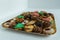 Some of Christmas cookies stored on a gold bowl of candy of different kinds of colors and shapes superimposed on each other on a