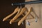 a some empty wooden hangers inside the home vintage wardrobe