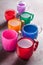 Some funny colorful plastic mugs