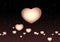 Some glowing Valentine hearts light bulbs on dark background. 3D render. 3d illustration