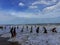 Some Indian students bathing enjoy at golden beach in puri city