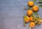 Some mandarine on wooden background