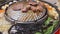 Some meat and vegetables being cooked