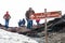 Some people practice walking and trekking on the top of Mount Etna in Sicily in Italy