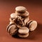 Some perfect brown macarons cakes against a monochromatic brown background.