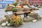 Some pumpkins on hay and ears of wheat in a wooden cart the season of harvest at an autumn festival in Moscow