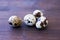 Some quail eggs on wooden