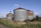 Some of the Rusting Old Style Grain silos at West Mains of Gardyne near Letham in Angus.