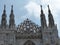Some spiers of the neogothic cathedral of Milan in Italy.