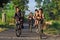 Some students go to school using their bicycles in the morning