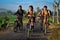 Some students go to school using their bicycles in the morning