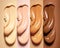 Some swatches of face cream foundation in different shades