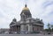 Some tourists come by bus to St. Isaac\'s Cathedral, the other
