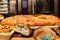 Some types of bread on display on a market counter