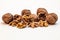 some walnuts against white background