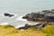 Some weathered eroded cracked rocks on the coastline