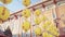 Some yellow lanterns labeled auspicious words hung up at a temple in Taiwan.